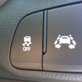 What does electronic stability control do in a car?